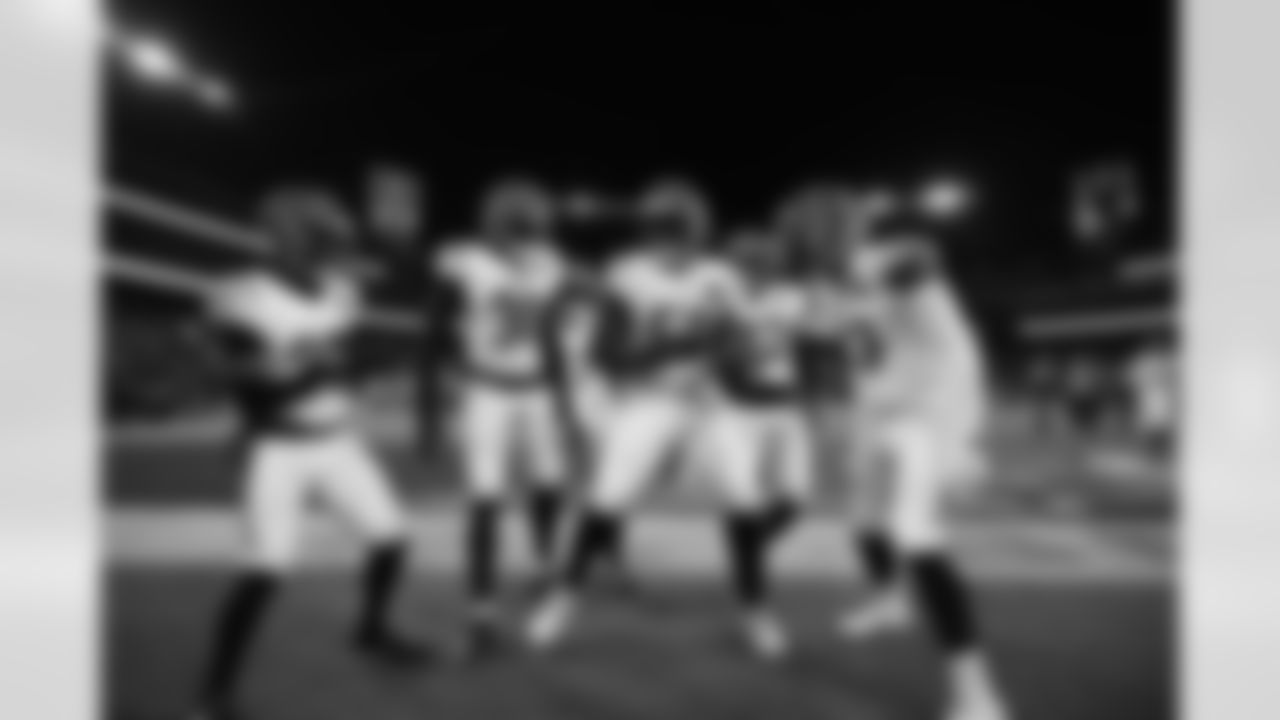 DE Cedric Johnson and the defense celebrate a turnover during Week 13 against the Baltimore Ravens, Thursday, Nov. 27, 2025.