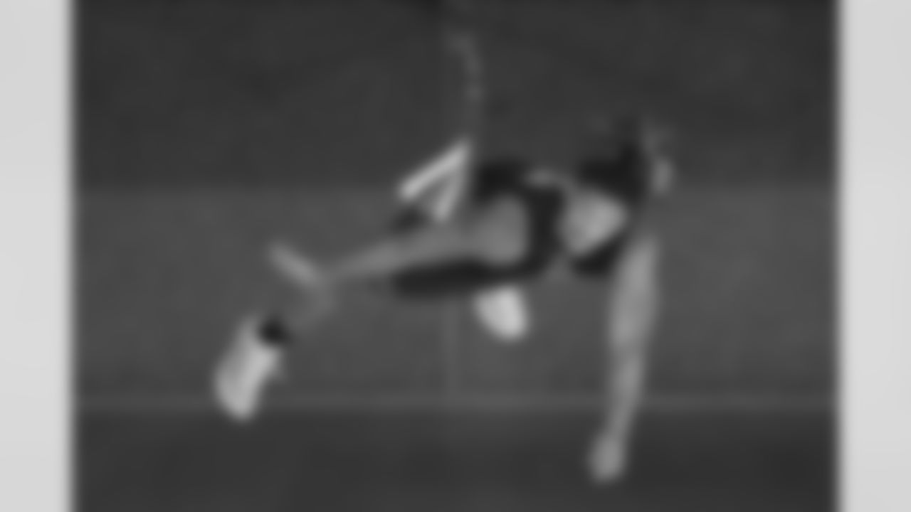 Texas A&M defensive lineman Cashius Howell (41) goes through drills and testing at the NFL football scouting combine in Indianapolis, Thursday, Feb. 26, 2026. (AP Photo/Eric Gay)