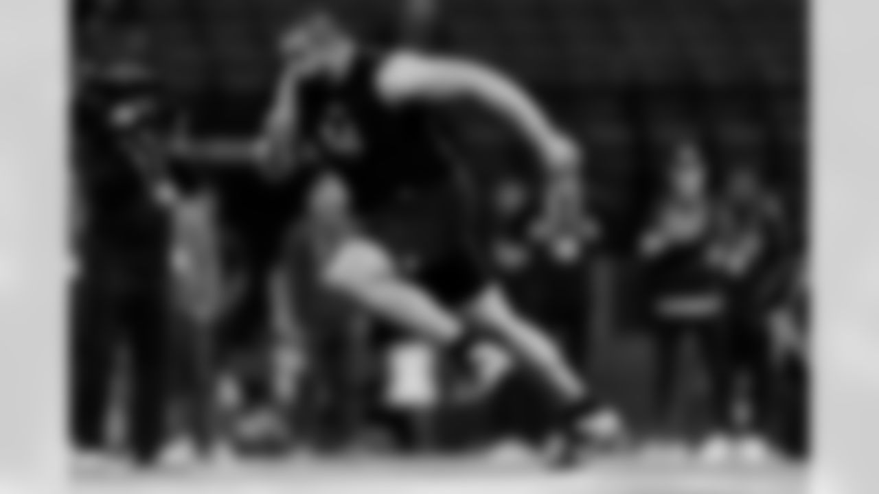 Georgia offensive lineman Dylan Fairchild participates in a drill at the NFL football scouting combine in Indianapolis, Sunday, March 2, 2025. (Brooke Sutton via AP)