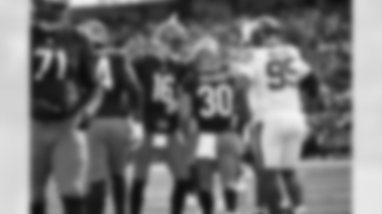 RB Chase Brown and QB Joe Flacco celebrate a touchdown during Week 8 against the New York Jets, Sunday, Oct. 26, 2025