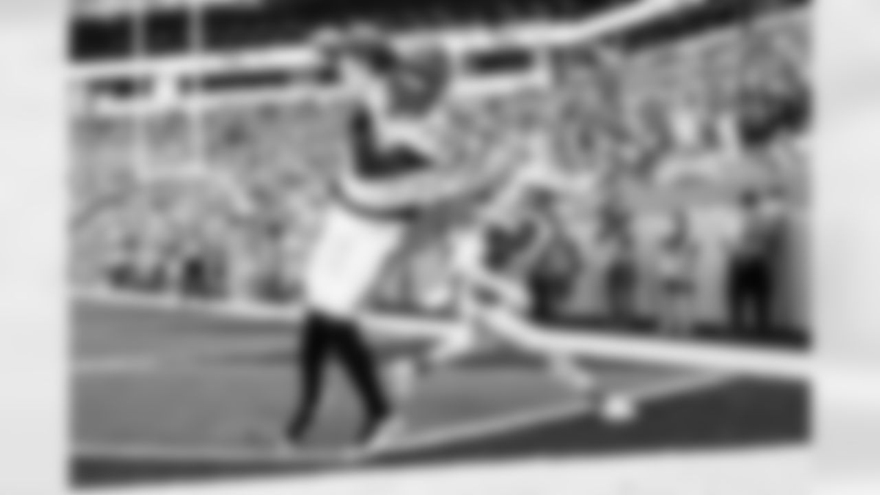 WR Tee Higgins scores a touchdown during Week 16 against the Miami Dolphins at Hard Rock Stadium, Sunday, Dec. 21, 2025.