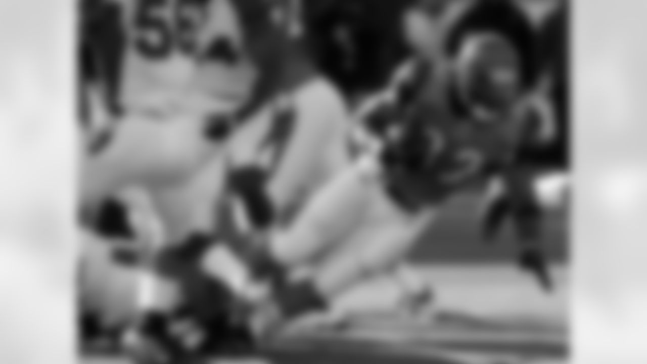 Cincinnati Bengals running back Cedric Benson (32) falls forward for a short gain in the first half of an NFL football game against the Arizona Cardinals, Saturday, Dec. 24, 2011, in Cincinnati. (AP Photo/Al Behrman)