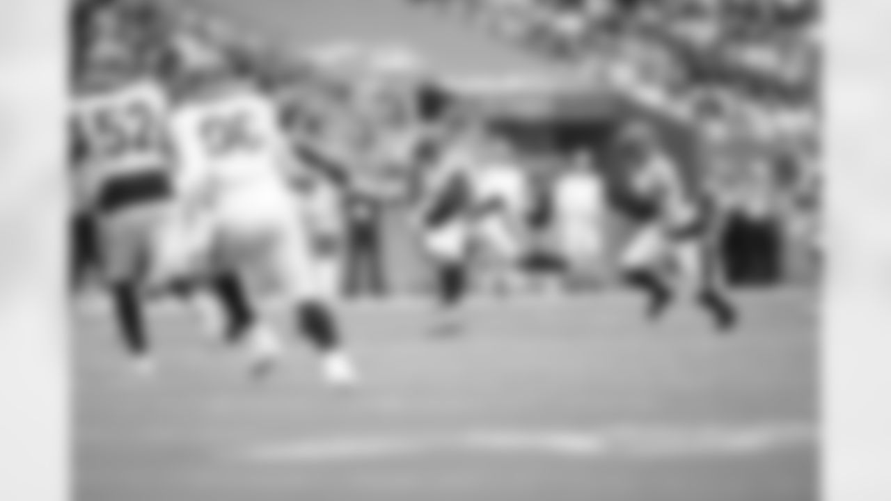 LB Barrett Carter intercepts a pass during Week 16 against the Miami Dolphins at Hard Rock Stadium, Sunday, Dec. 21, 2025.