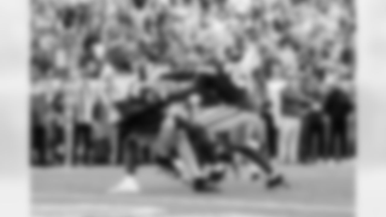 WR Tee Higgins catches a pass during Week 6 against the Packers in Green Bay, Sunday, Oct. 12, 2025.