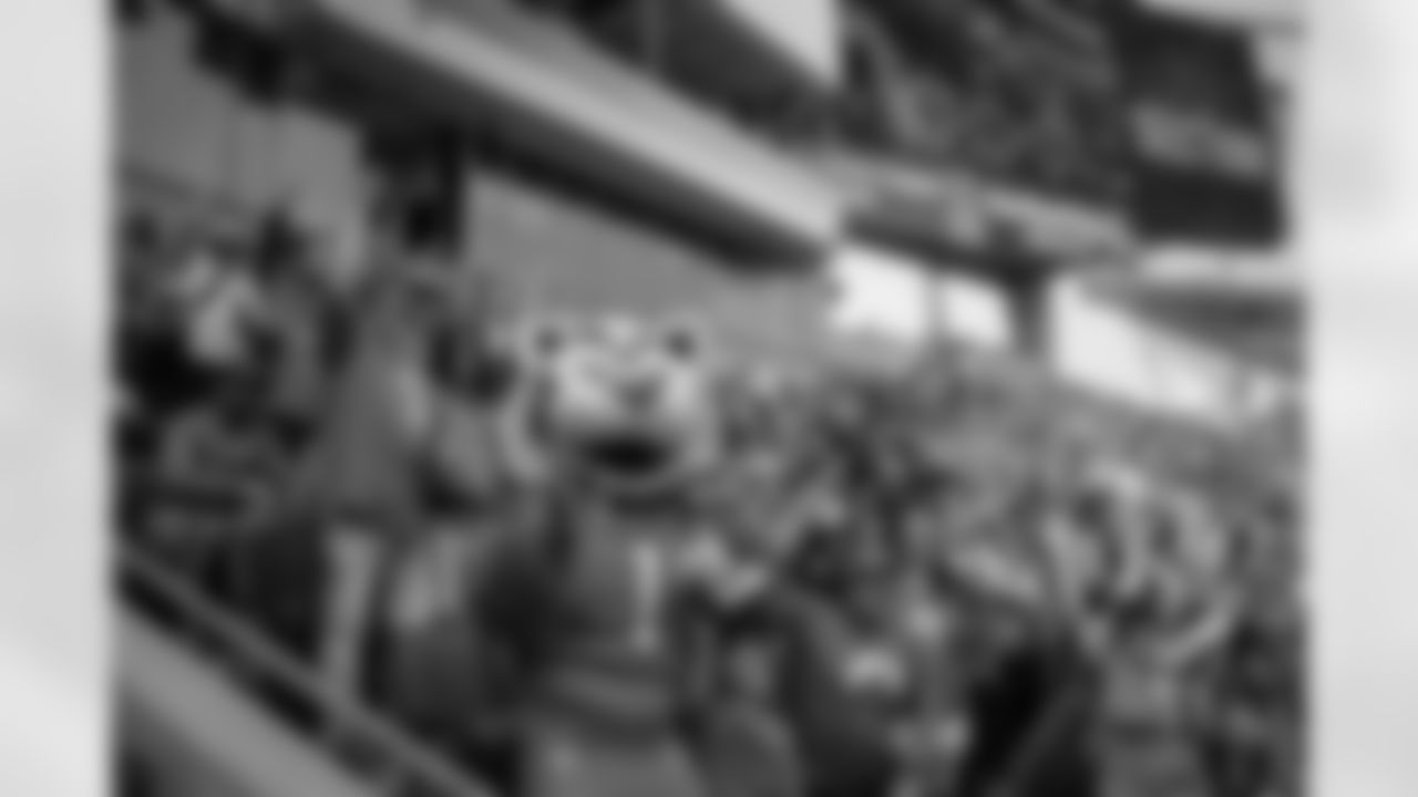 Who Dey poses with fans during Open In Orange, Sunday, September 8, 2024.