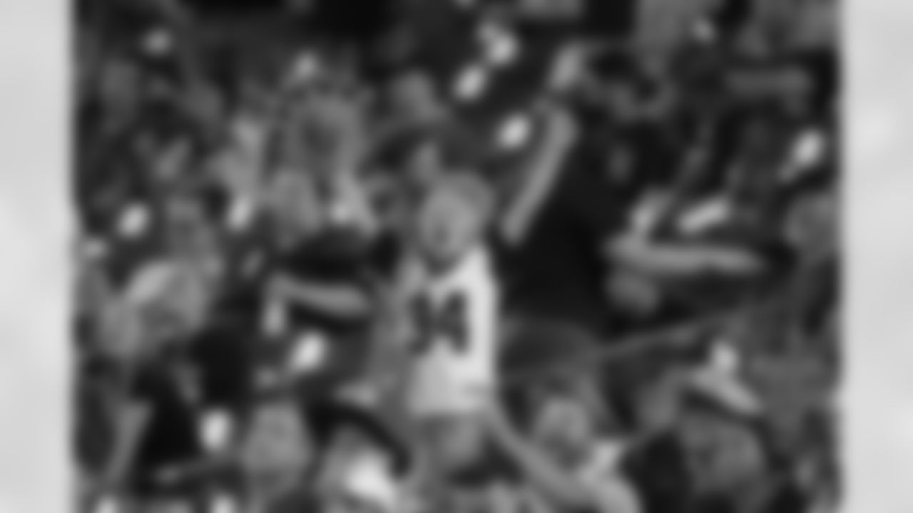 A young Bengals fan roars at Cincinnati's first preseason game at Paycor Stadium against the Tampa Bay Buccaneers.