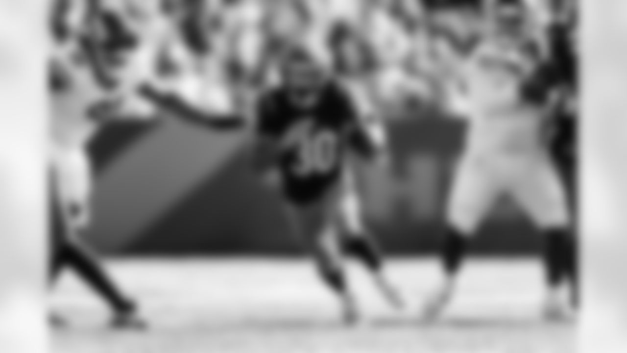 RB Chase Brown carries the ball during Week 8 against the New York Jets at Paycor Stadium, Sunday, Oct. 26, 2025.