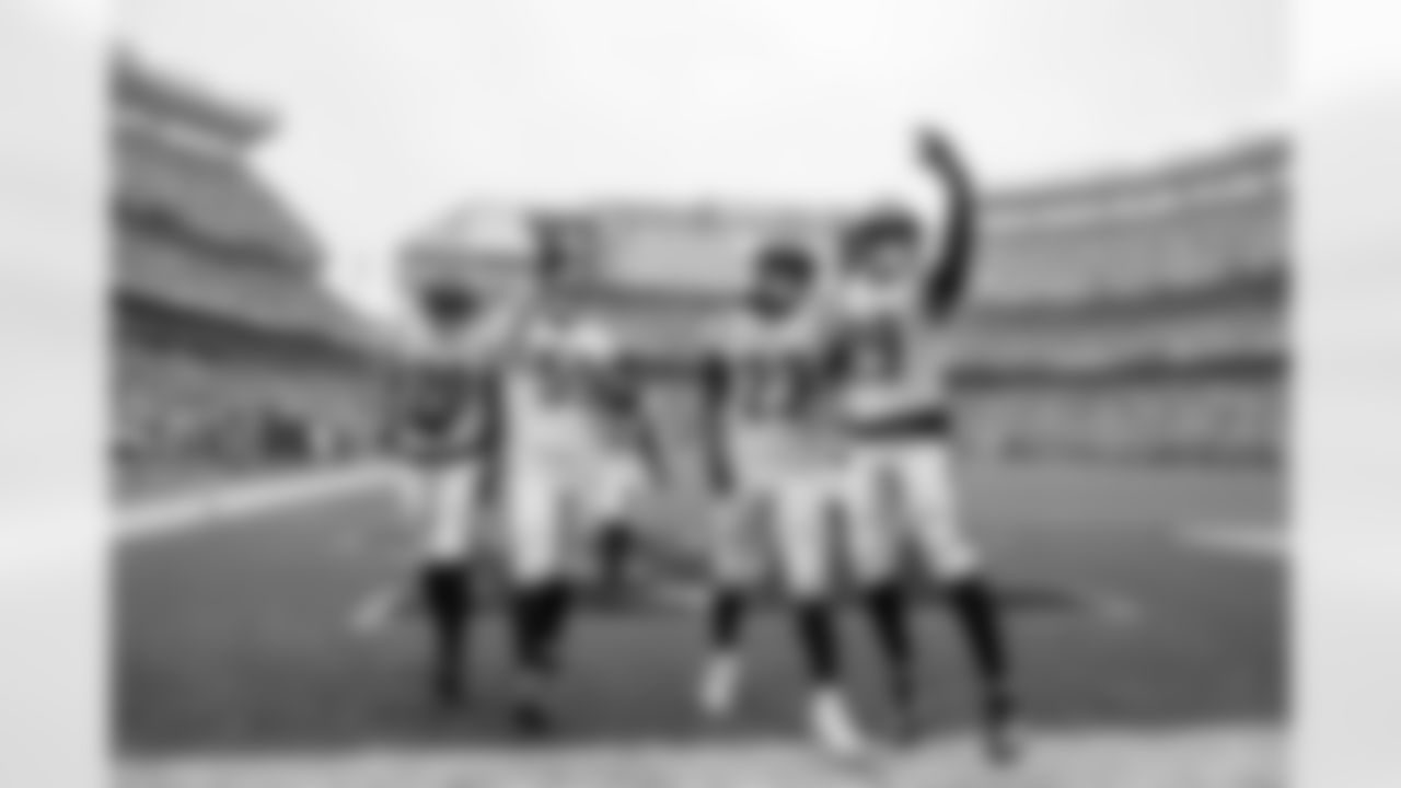 D.J. Turner, Akeem Davis-Gaither, Dax Hill and Cam Taylor-Britt celebrate an interception against the Browns in Cleveland, Week 1 of 2023.