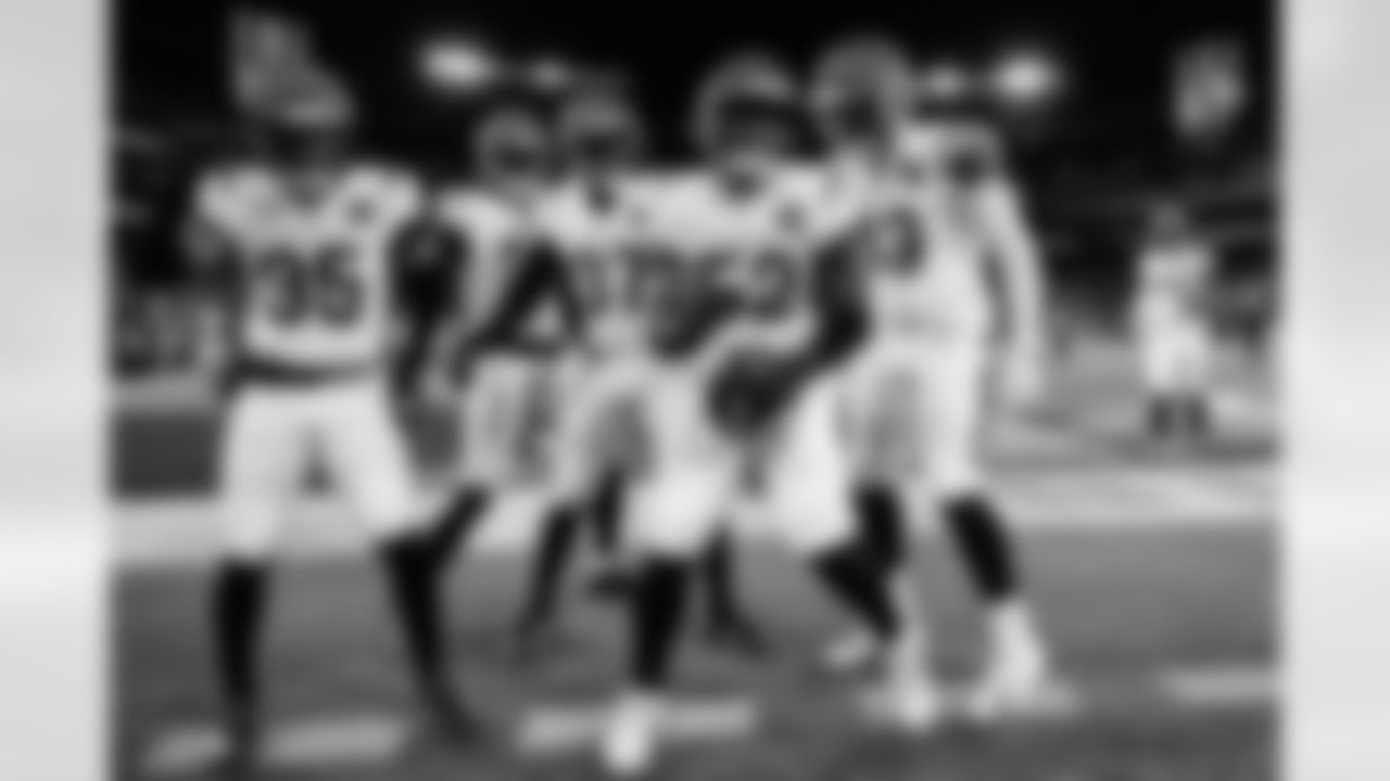 The Bengals defense celebrates a turnover during Week 13 against the Ravens, Thursday, Nov. 27, 2025.