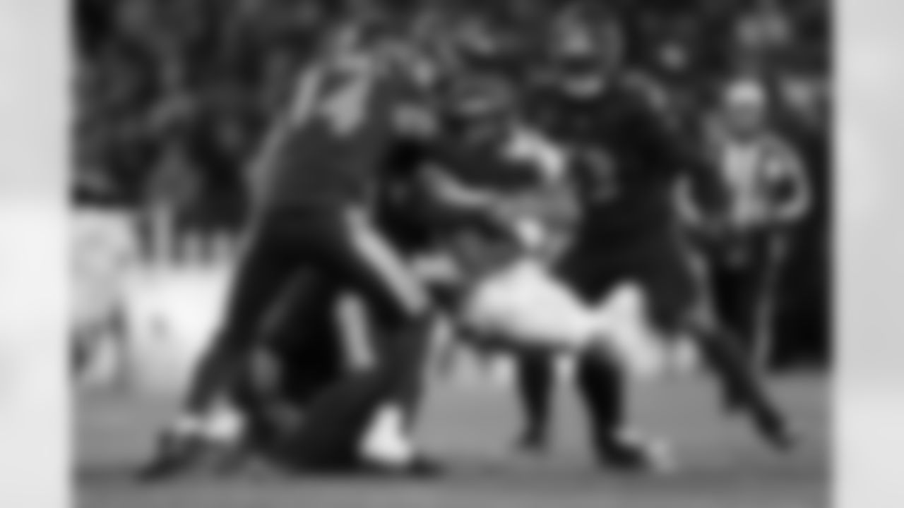 Cincinnati Bengals running back Chase Brown (30) runs the ball during an NFL football game against the Baltimore Ravens on Wednesday, November 26, 2025 in Baltimore, Maryland.