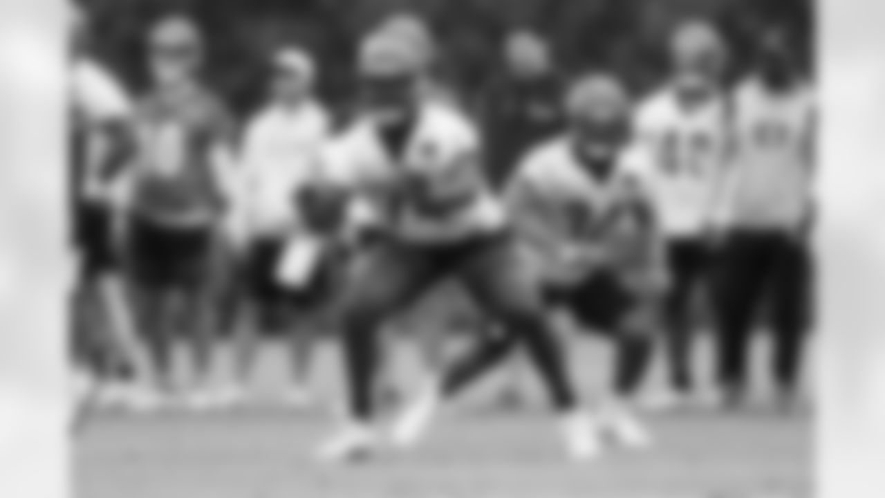 OT Jalen Rivers blocks for RB Samaje Perine during OTAs at Kettering Health Practice Fields, Tuesday, May 27, 2025.