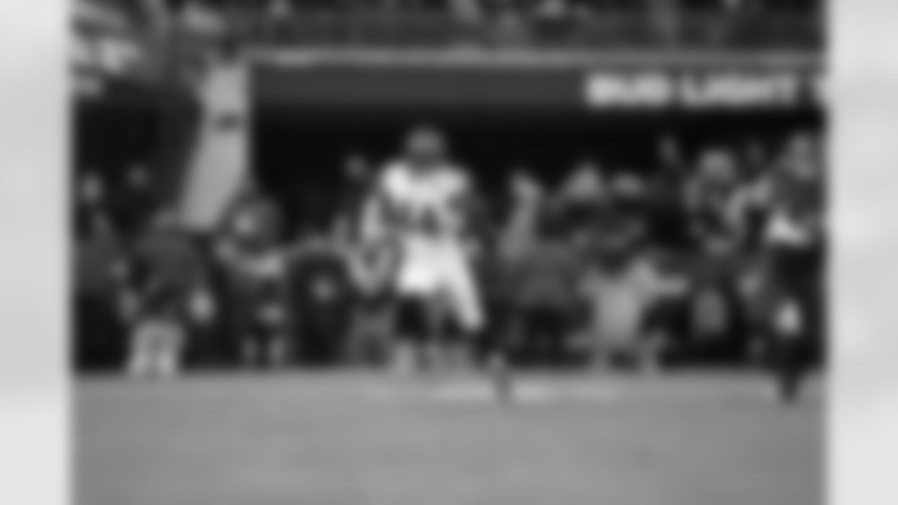 LB Demetrius Knight Jr. returns an interception during Week 13 against the Baltimore Ravens, Thursday, Nov. 27, 2025.