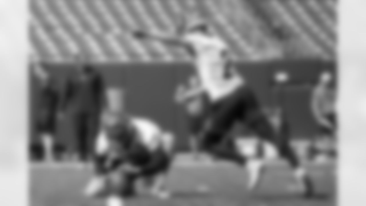 K Evan McPherson kicks a field goal as P Ryan Rehkow holds during mandatory minicamp at Paycor Stadium, Thursday, June 12, 2025.