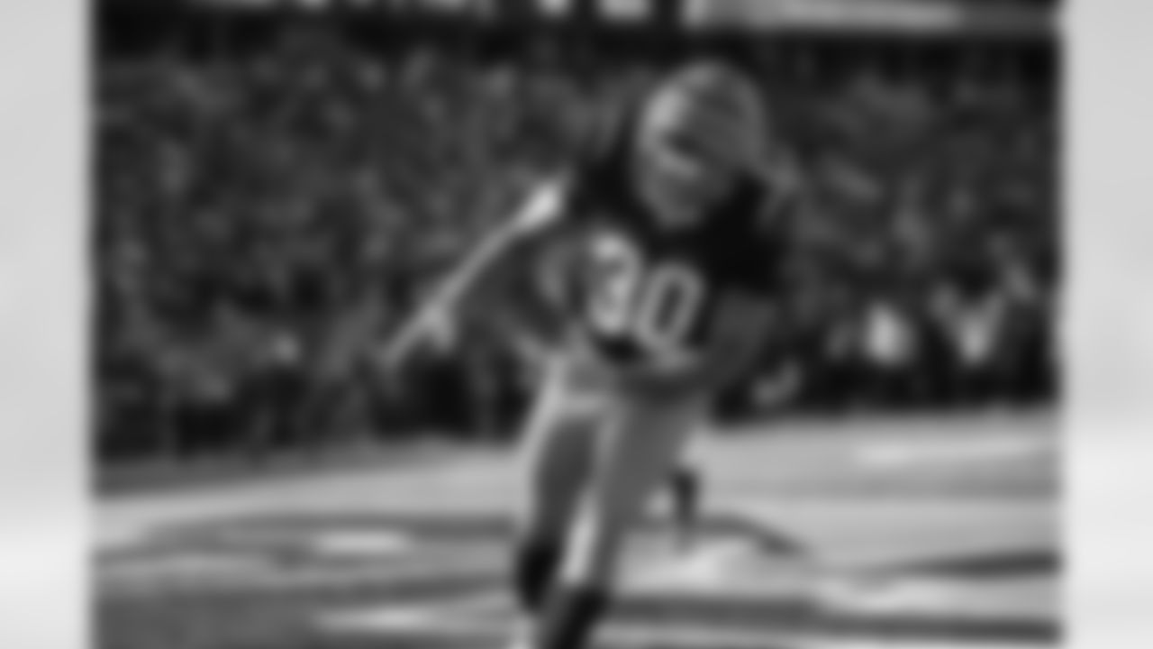RB Chase Brown celebrates a touchdown during Week 8 against the New York Jets, Sunday, Oct. 26, 2025
