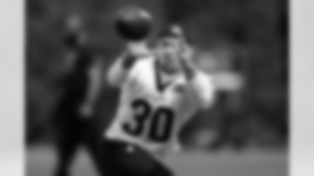 RB Chase Brown catches a pass during phase two of offseason workouts at Kettering Health Practice Fields, Wednesday, May 7, 2025.