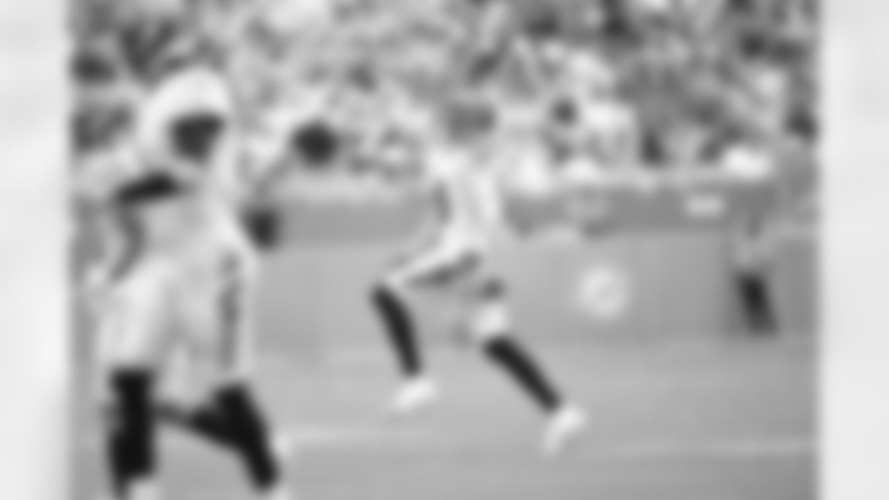 TE Mike Gesicki celebrates a touchdown during Week 16 against the Miami Dolphins at Hard Rock Stadium, Sunday, Dec. 21, 2025.