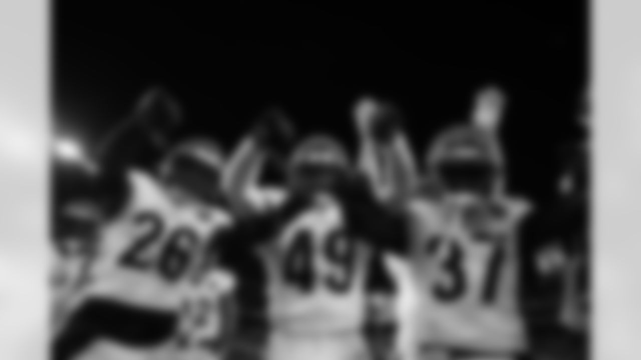 The Bengals defense celebrates an interception during Week 13 against the Baltimore Ravens, Thursday, Nov. 27, 2025.