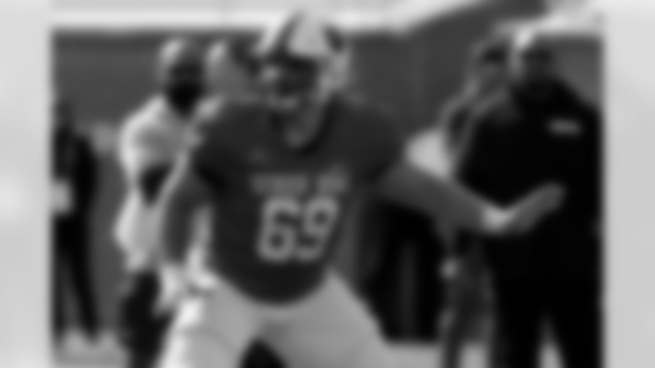 American team offensive lineman Jacob Bayer of Arkansas State (69) runs through drills during practice for the Senior Bowl NCAA college football game, Wednesday, Jan. 29, 2025, in Mobile, Ala. (AP Photo/Butch Dill)