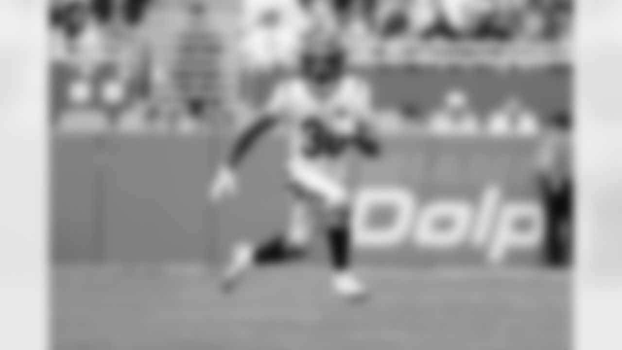 RB Chase Brown during Week 16 against the Miami Dolphins at Hard Rock Stadium, Sunday, Dec. 21, 2025.