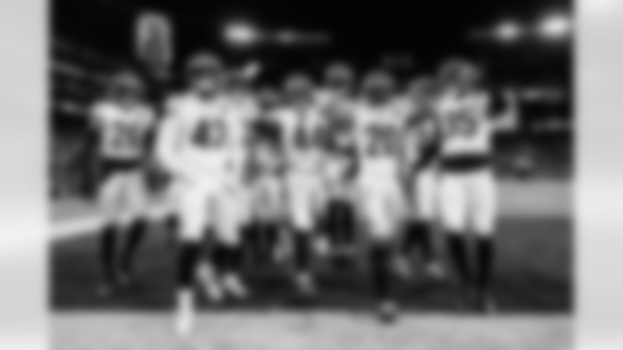 The Bengals defense celebrates an interception during Week 13 against the Baltimore Ravens, Thursday, Nov. 27, 2025.