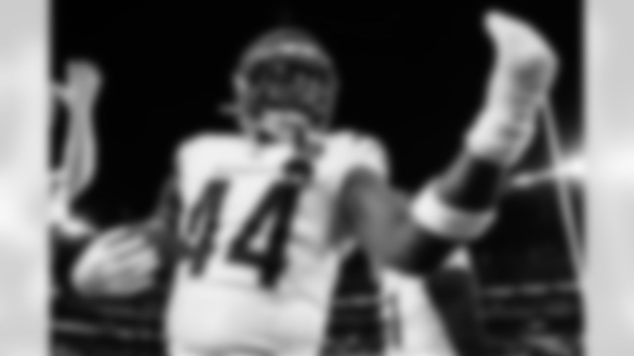 LB Demetrius Knight Jr. celebrates an interception during Week 13 against the Baltimore Ravens, Thursday, Nov. 27, 2025.