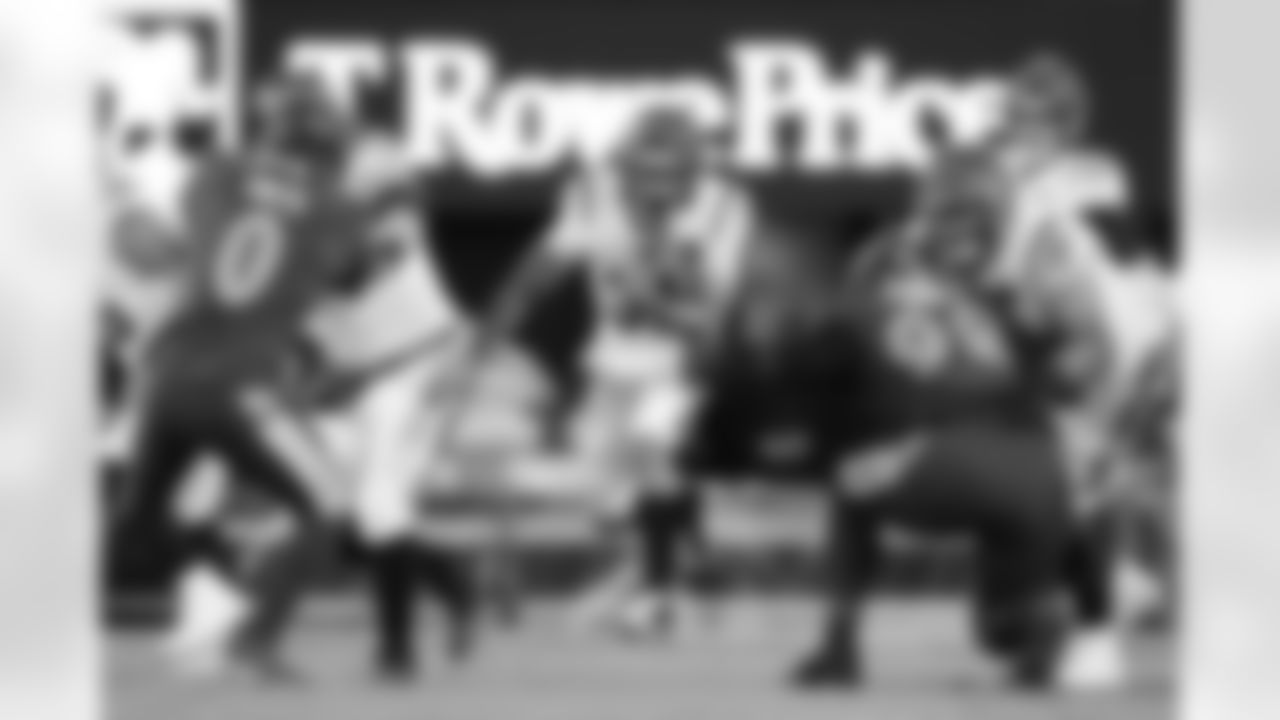 Cincinnati Bengals running back Chase Brown (30) runs the ball during an NFL football game against the Baltimore Ravens on Thursday, November 27, 2025 in Baltimore, Maryland.