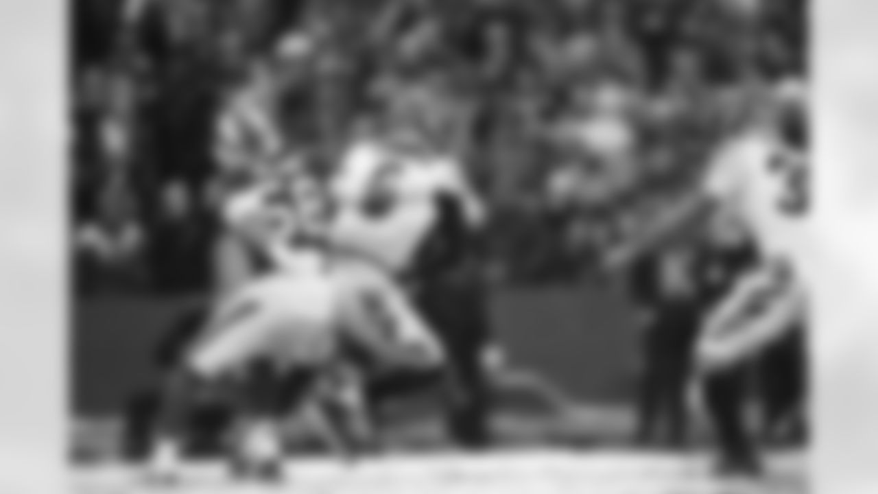 QB Joe Burrow evades a defender during Week 14 against the Buffalo Bills, Sunday, Dec. 7, 2025.