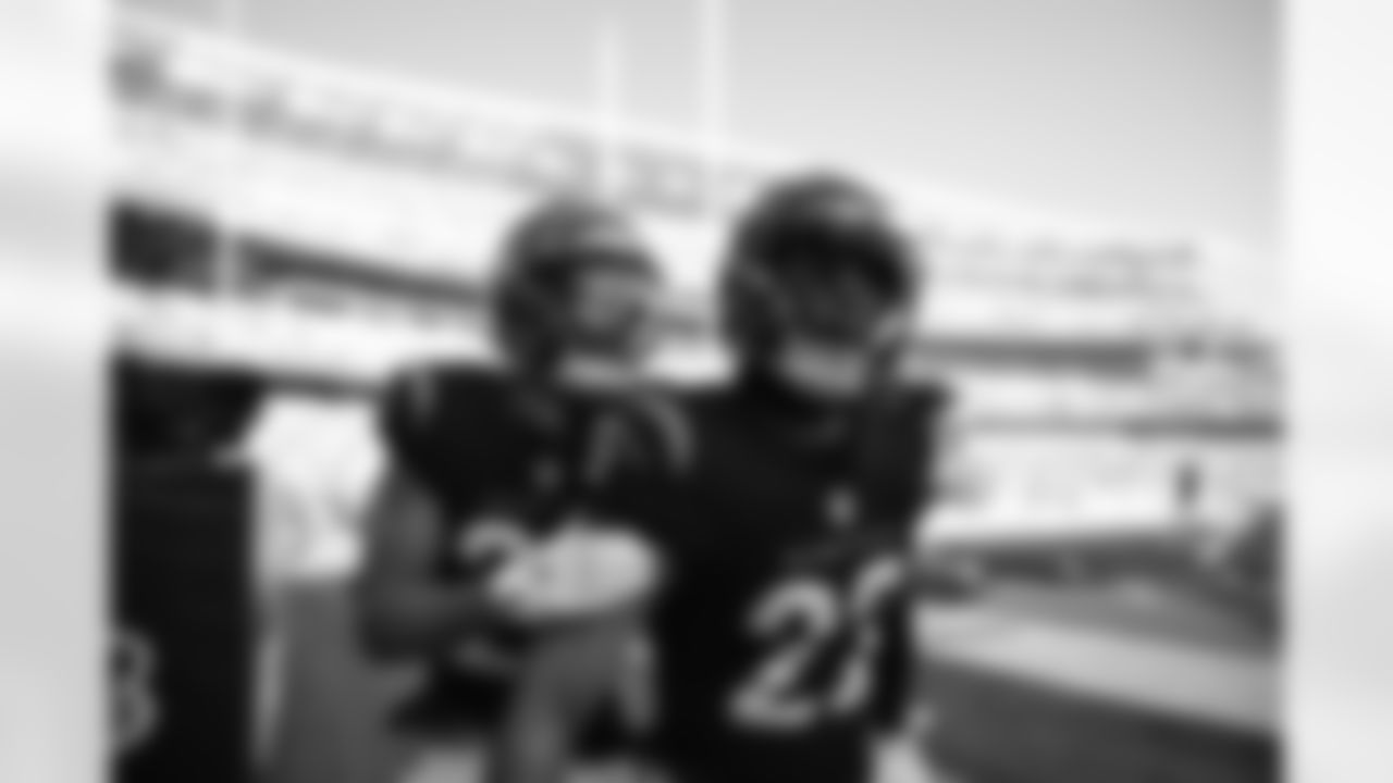 S Geno Stone and CB DJ Turner II celebrate Stone's interception returned for a touchdown during Week 12 against the New England Patriots at Paycor Stadium, Sunday, Nov. 23, 2025.