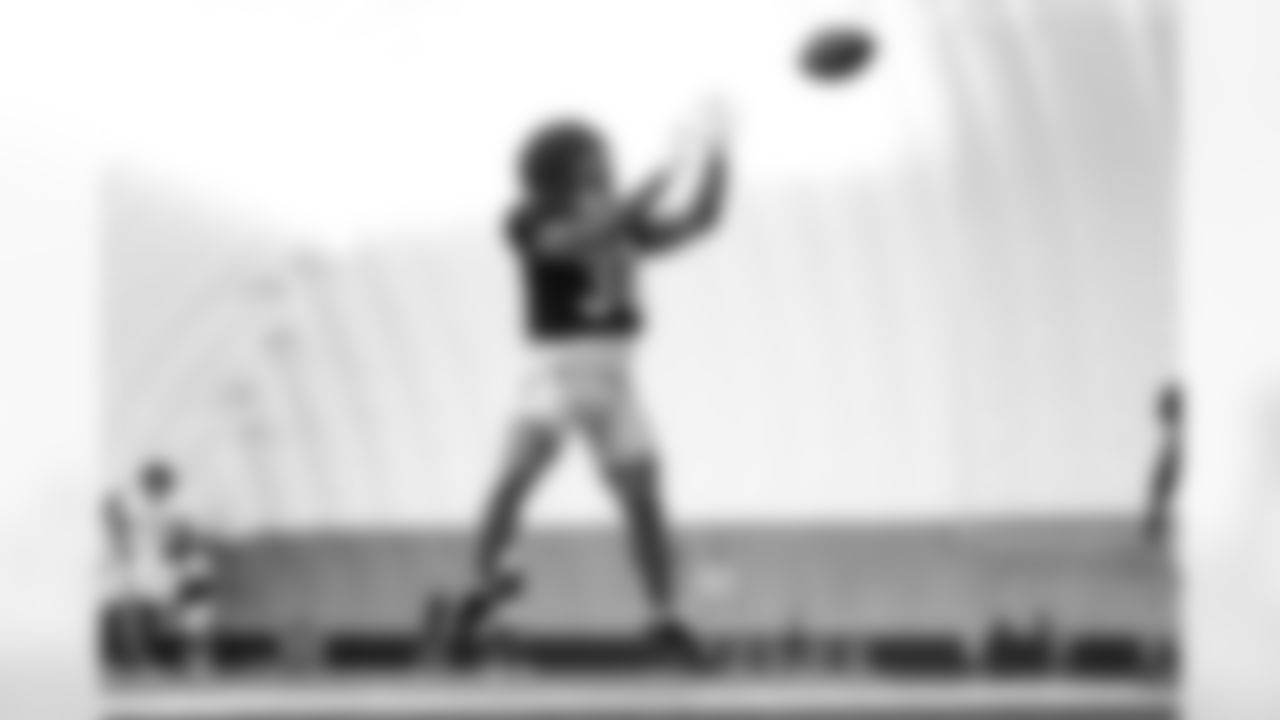 Bengals RB Chase Brown catches a pass during practice, Wednesday, August 28, 2024.