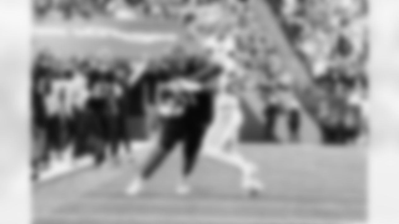 OT Cody Ford runs after the catch during Week 17 against the Arizona Cardinals at Paycor Stadium, Sunday, Dec. 28, 2025.