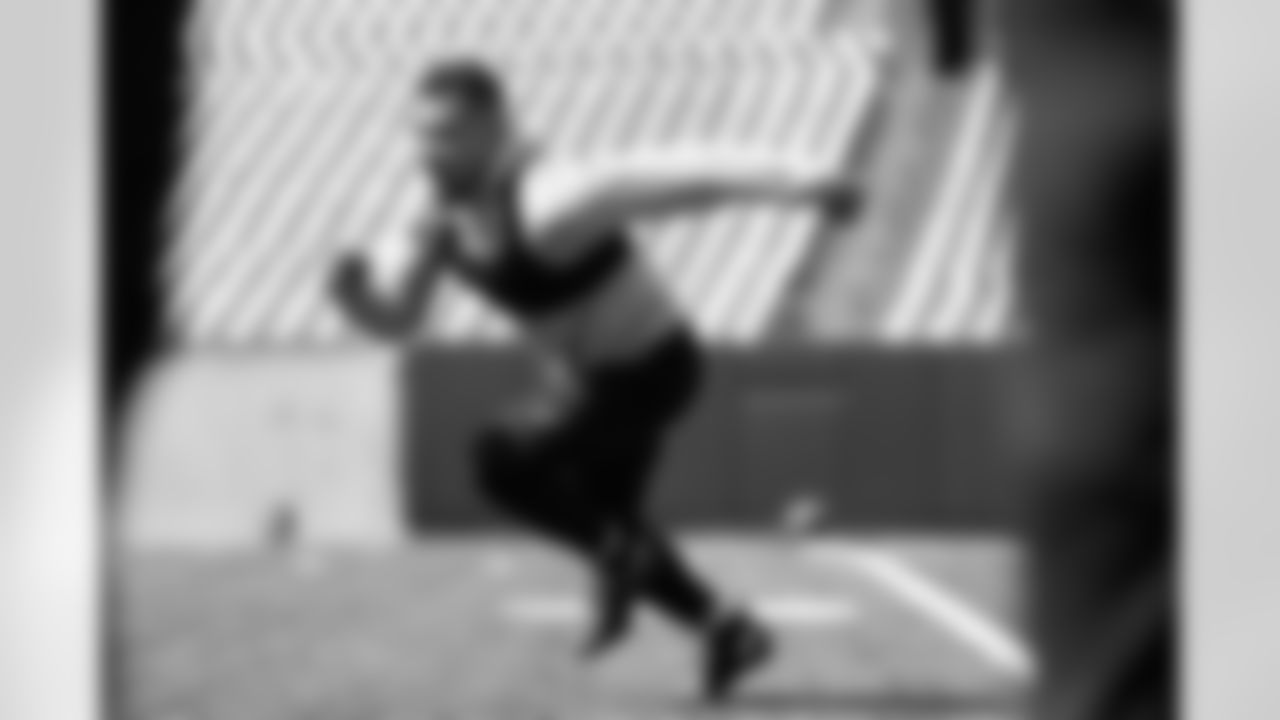 RB Chase Brown runs during phase one of offseason training at Paycor Stadium, Tuesday, April 22, 2025.