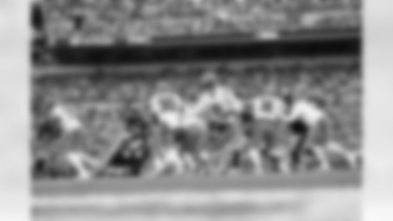 QB Joe Flacco hands the ball to RB Chase Brown during Week 11 against the Steelers in Pittsburgh, Sunday, Nov. 16, 2025.