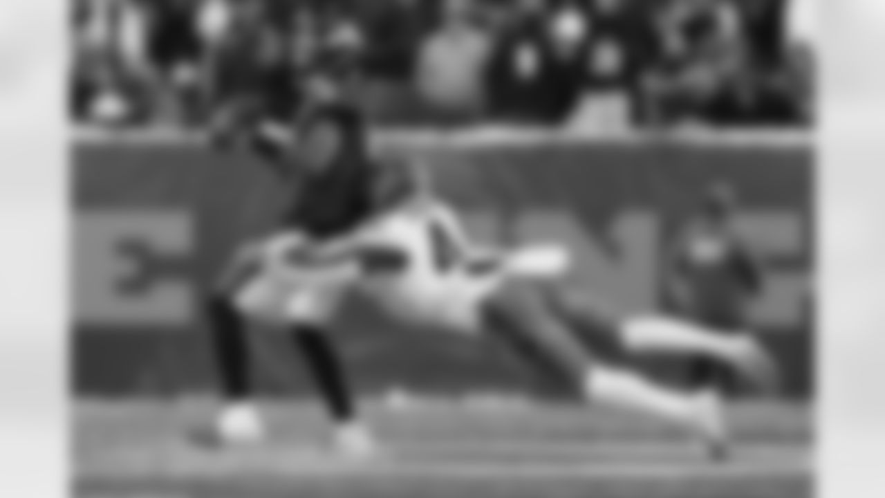 Cincinnati Bengals linebacker Demetrius Knight Jr. (44) sacks Baltimore Ravens quarterback Lamar Jackson (8) during the second half of an NFL football game, Sunday, Dec. 14, 2025, in Cincinnati. (AP Photo/Jeff Dean)