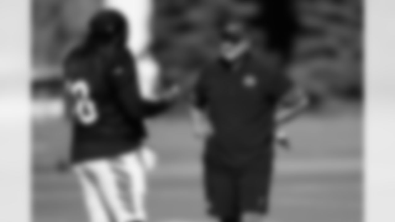 DC Al Golden talks with DT T.J. Slaton Jr. during Day 16 of training camp at Kettering Health Practice Fields, Saturday, Aug. 16, 2025.
