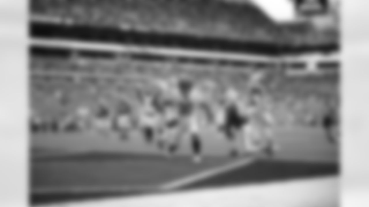 RB Chase Brown celebrates a touchdown during Week 16 against the Miami Dolphins at Hard Rock Stadium, Sunday, Dec. 21, 2025.