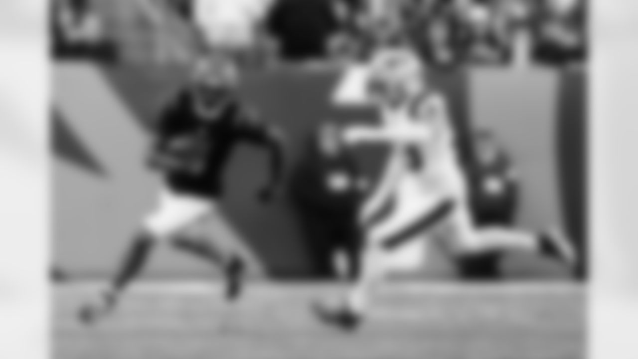 WR Tee Higgins runs after the catch during Week 12 against the New England Patriots at Paycor Stadium, Sunday, Nov. 23, 2025.