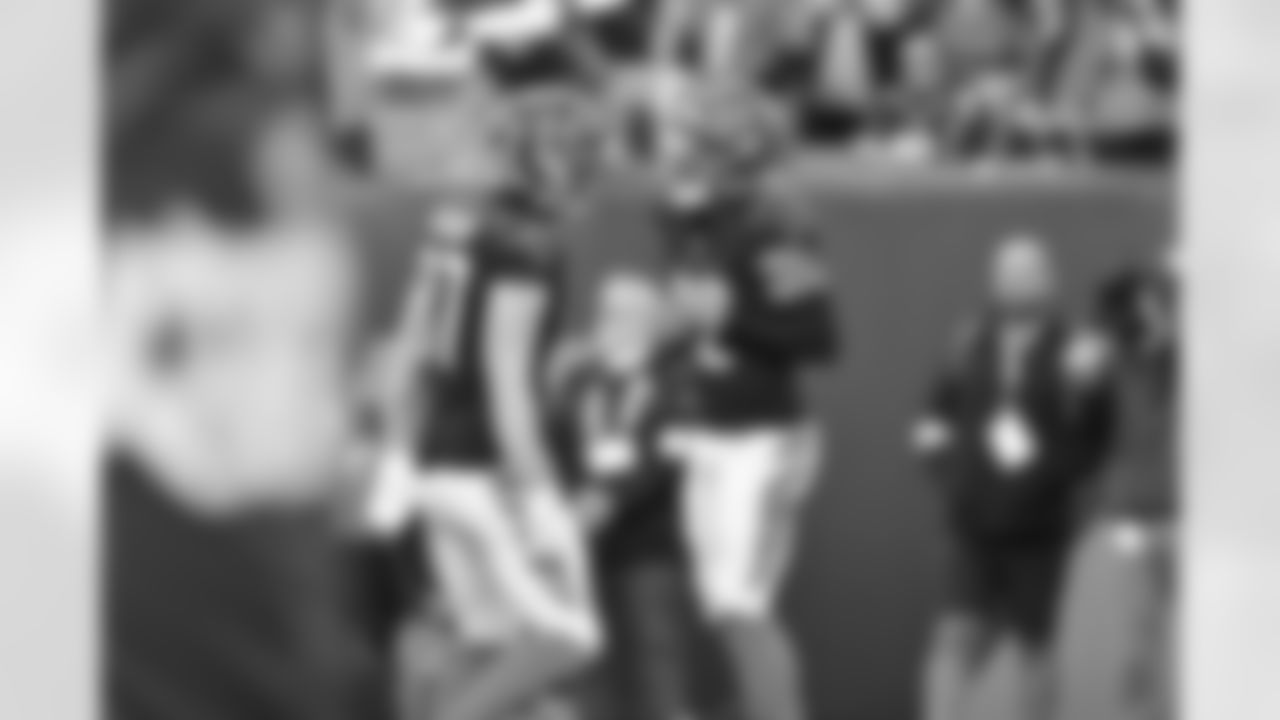 WR Mitch Tinsley celebrates a touchdown with TE Tanner Hudson during Week 12 against the New England Patriots at Paycor Stadium, Sunday, Nov. 23, 2025.