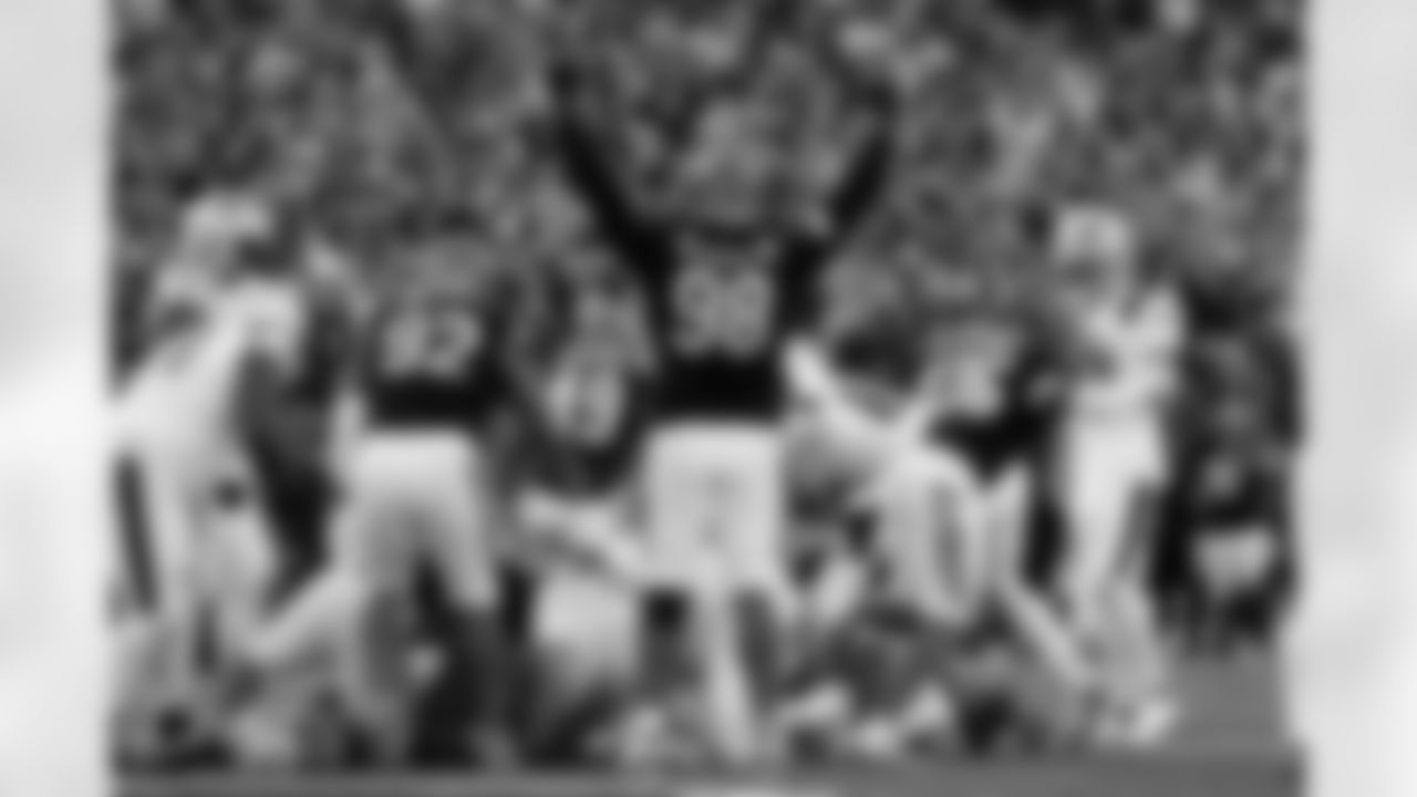 Cincinnati Bengals defensive tackle T.J. Slaton Jr. (98) celebrates during an NFL football game against the New England Patriots on Sunday, November 23, 2025 in Cincinnati, Ohio.