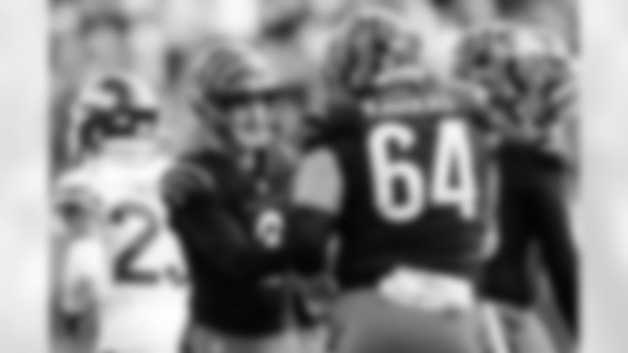 K Evan McPherson celebrates a field goal with C Ted Karras during Week 8 against the New York Jets, Sunday, Oct. 26, 2025