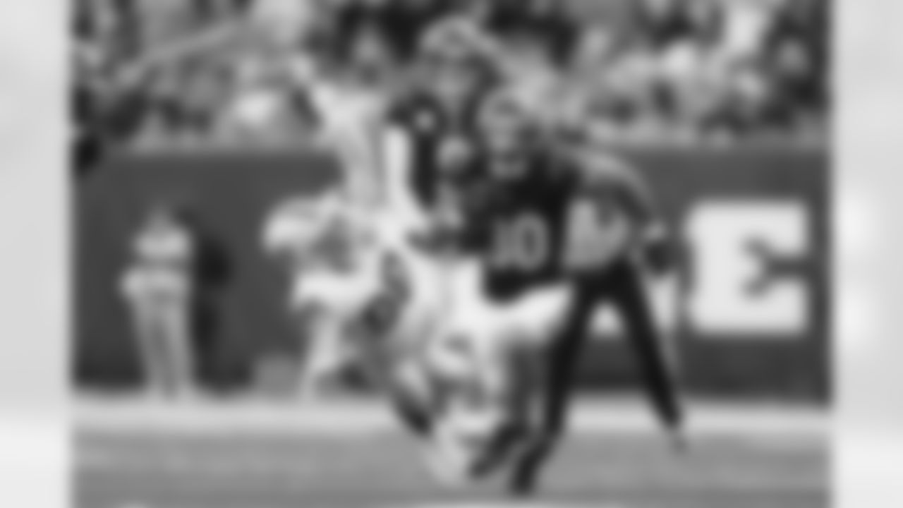 RB Chase Brown runs the football against the Las Vegas Raiders, Sunday, Nov. 3, 2024.