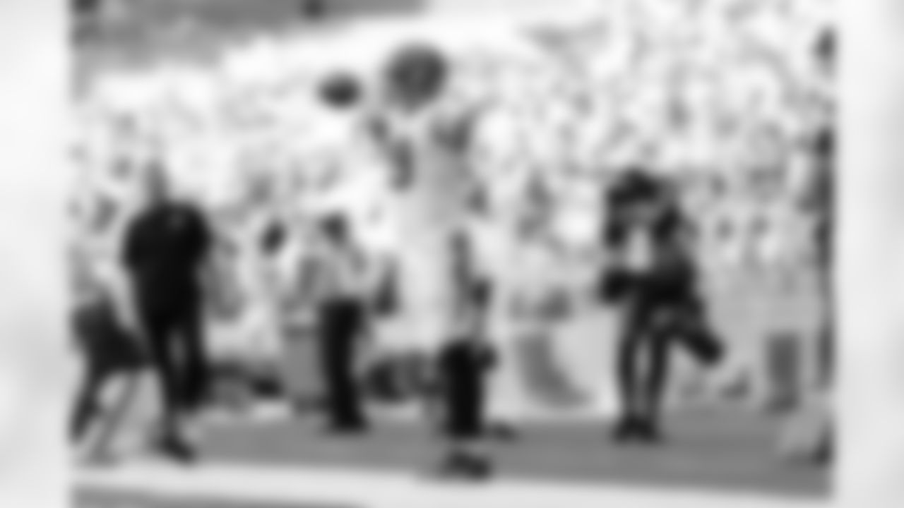 TE Drew Sample celebrates a play during Week 16 against the Miami Dolphins at Hard Rock Stadium, Sunday, Dec. 21, 2025.