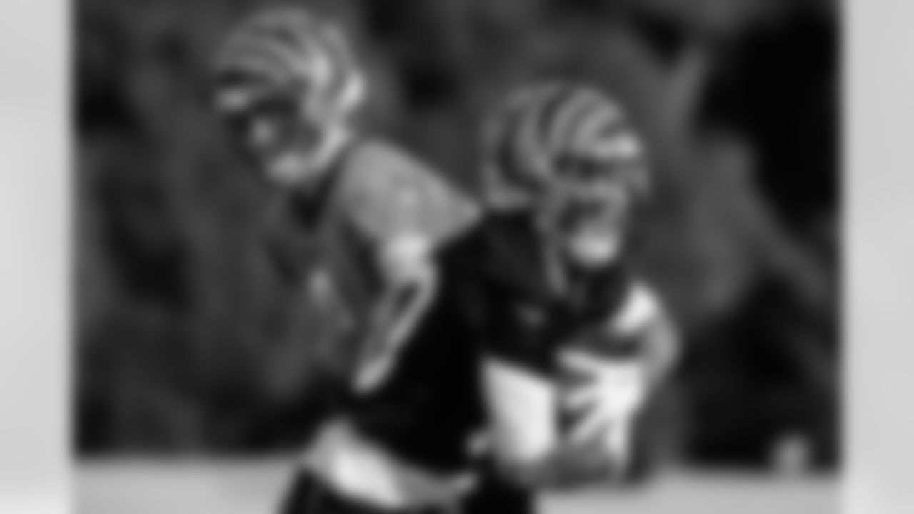 QB Joe Burrow and RB Chase Brown during practice at Kettering Health Practice Fields, Wednesday, Dec. 24, 2025.