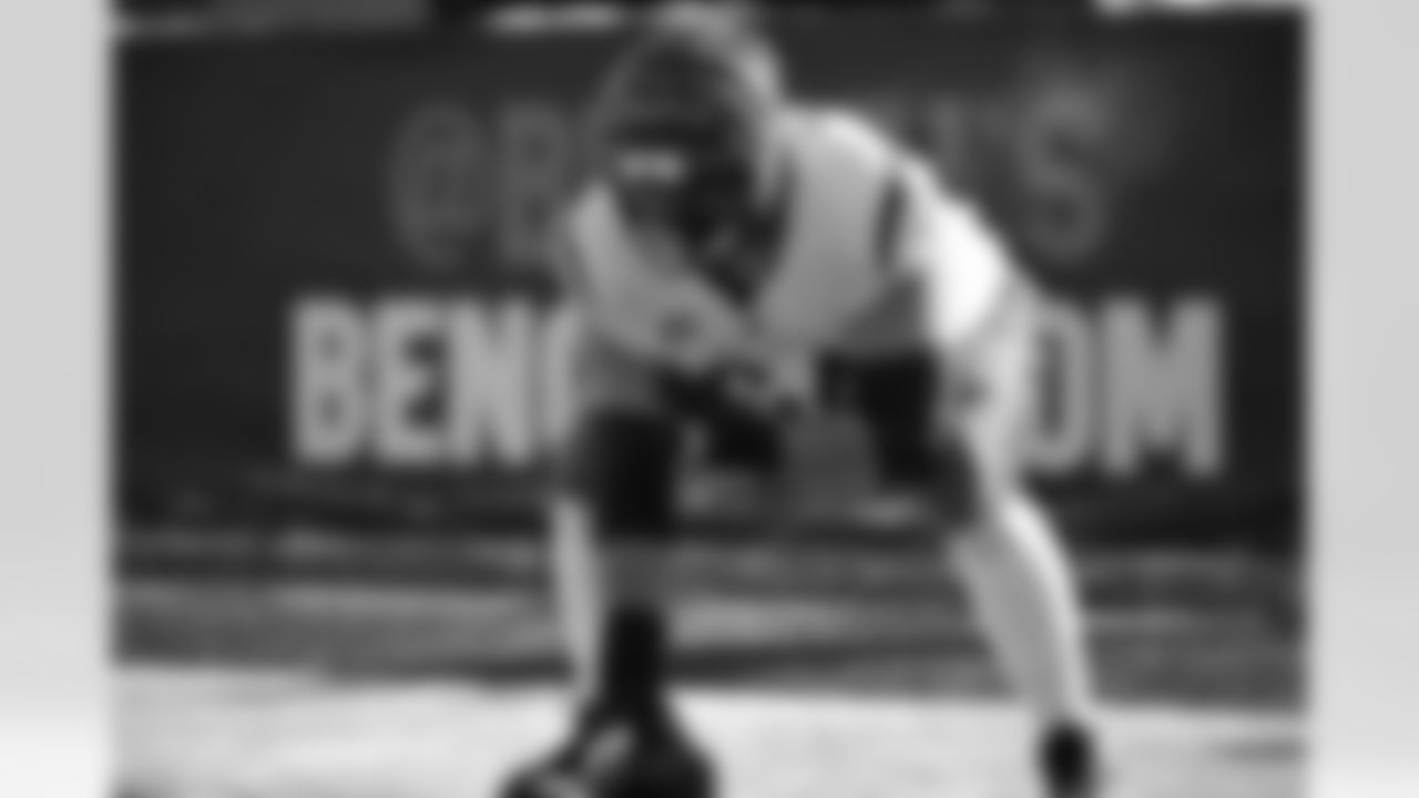 C Ted Karras warms up ahead of Week 15 against the Ravens at Paycor Stadium, Sunday, Dec. 14, 2025.