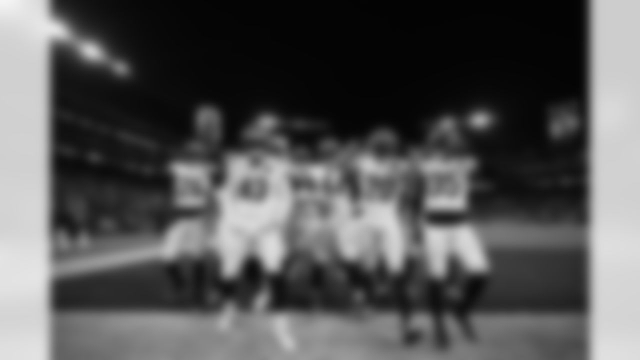 The Bengals defense celebrates an interception during Week 13 against the Baltimore Ravens, Thursday, Nov. 27, 2025.