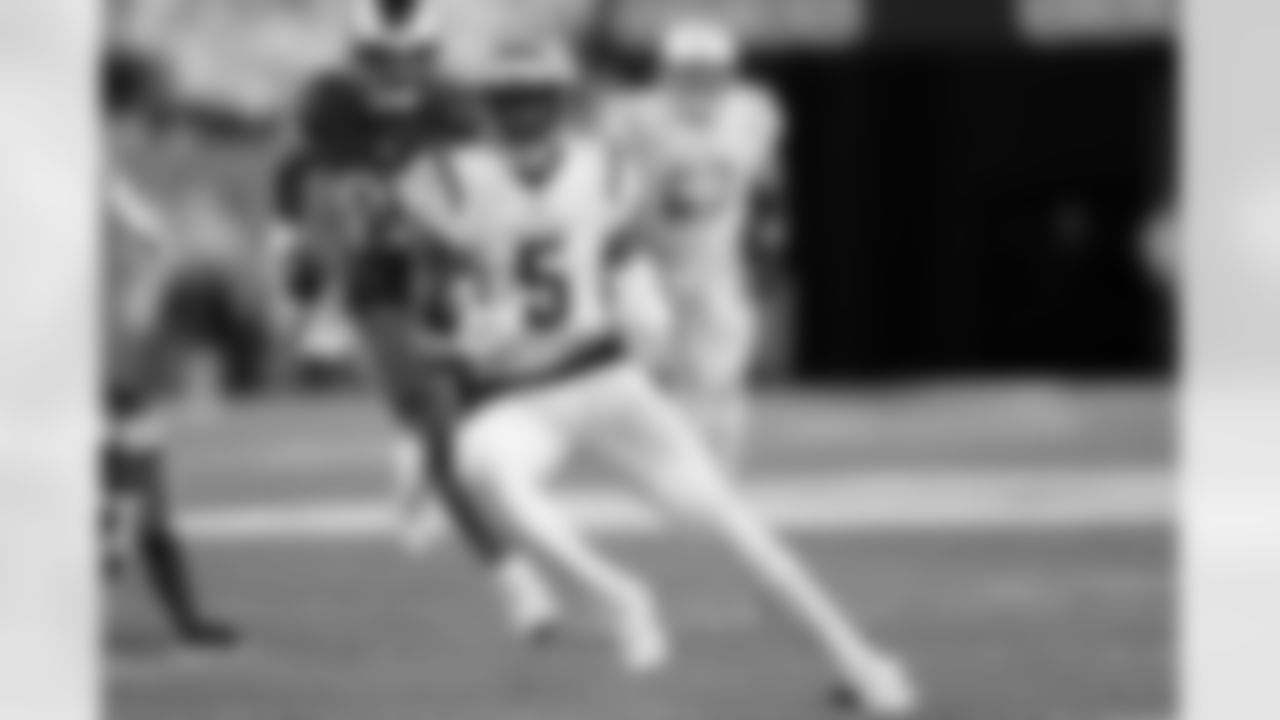 Cincinnati Bengals wide receiver Tee Higgins (5) runs with the ball after catching a pass during an NFL football game against the Los Angeles Rams on Monday, Sept. 25, 2023, in Cincinnati. The Bengals won 19-16.