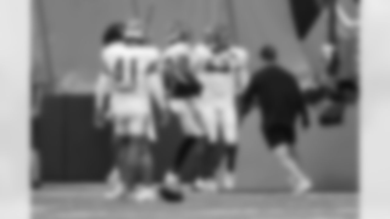 Members of the Bengals defense celebrate a play during training camp at the IEL Indoor Facility, Thursday, July 31, 2025.