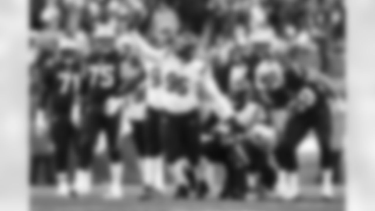 Cincinnati Bengals defensive tackle Zach Carter (95) reacts after a defensive stop during an NFL game against the New England Patriots, Saturday, Dec.24, 2022 in Foxborough, Mass. The Bengals defeated the Patriots 22-18. (Kathryn Riley via AP)