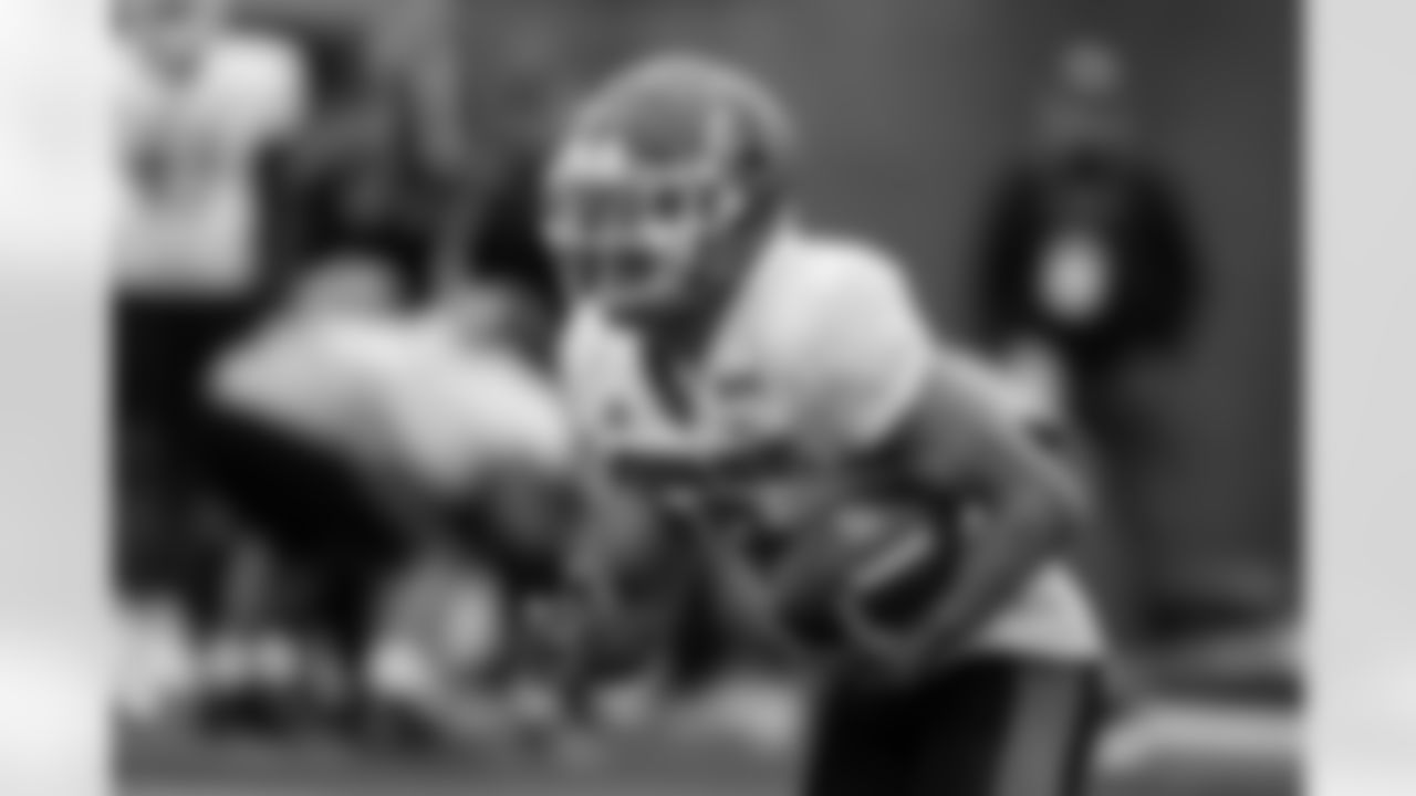 National running back Chase Brown of Illinois carries the ball during practice for the Senior Bowl NCAA college football game Wednesday, Feb. 1, 2023, in Mobile, Ala.. (AP Photo/Butch Dill)