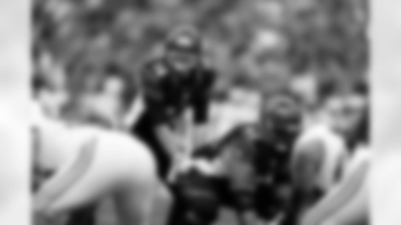 Cincinnati Bengals quarterback Andy Dalton (14) calls signals before a play during an NFL football game against the Miami Dolphins, Sunday, Oct. 7, 2012 in Cincinnati. The Dolphins won the game, 17-13. (AP Photo/Joe Robbins)