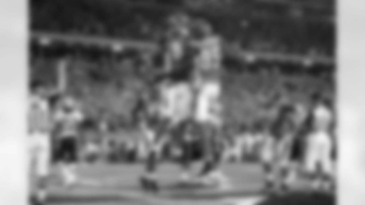 T.J. Houshmandzadeh #84 of the Cincinnati Bengals celebrates his touchdown catch with teammate Chad Johnson #85 against the New England Patriots during an NFL football game on Oct. 1, 2007 in Cincinnati. The Patriots defeated the Bengals 34-13. (Joe Robbins via AP)